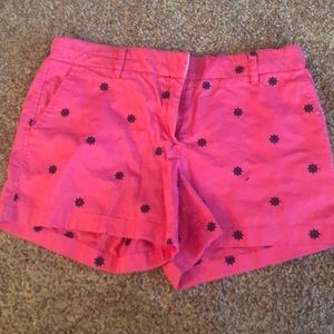 Pink shorts with Navy wheel accents